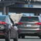 Cars loading onto ferry at terminal