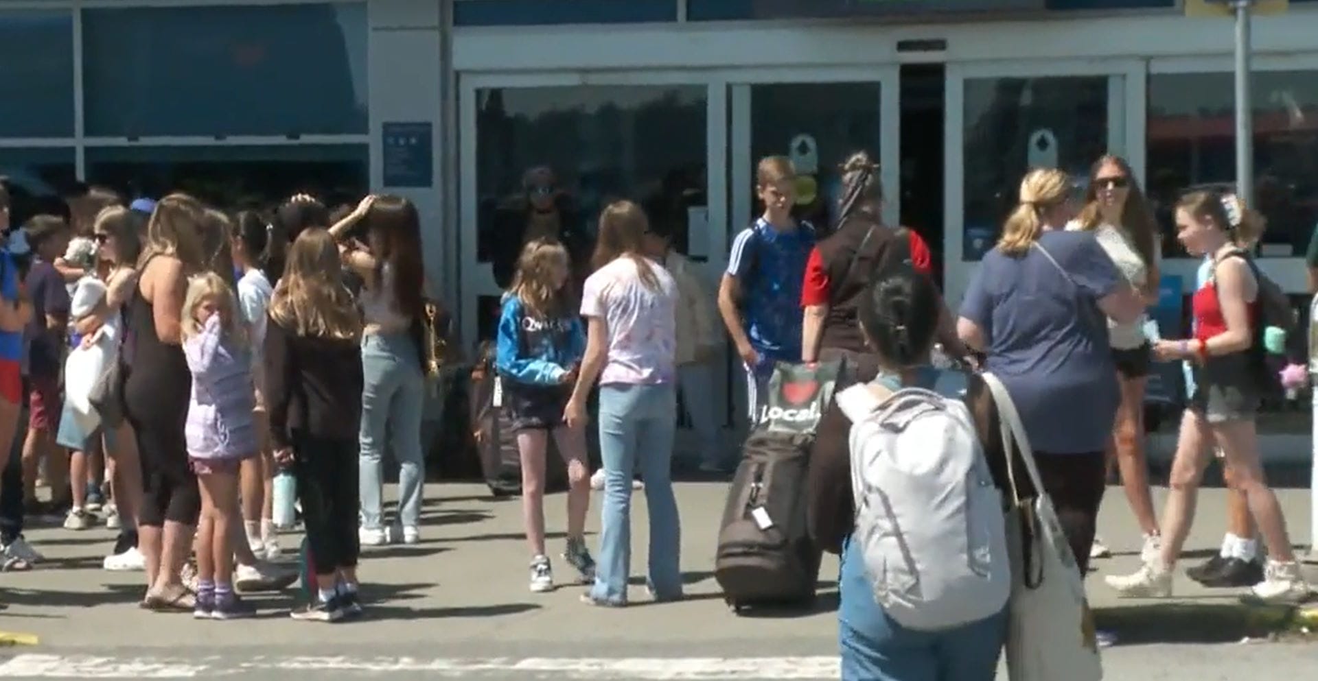 Students lurking outside BC ferry terminal buildling