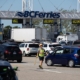 A B.C. Ferries worker directs traffic at Tsawwassen ferry terminal